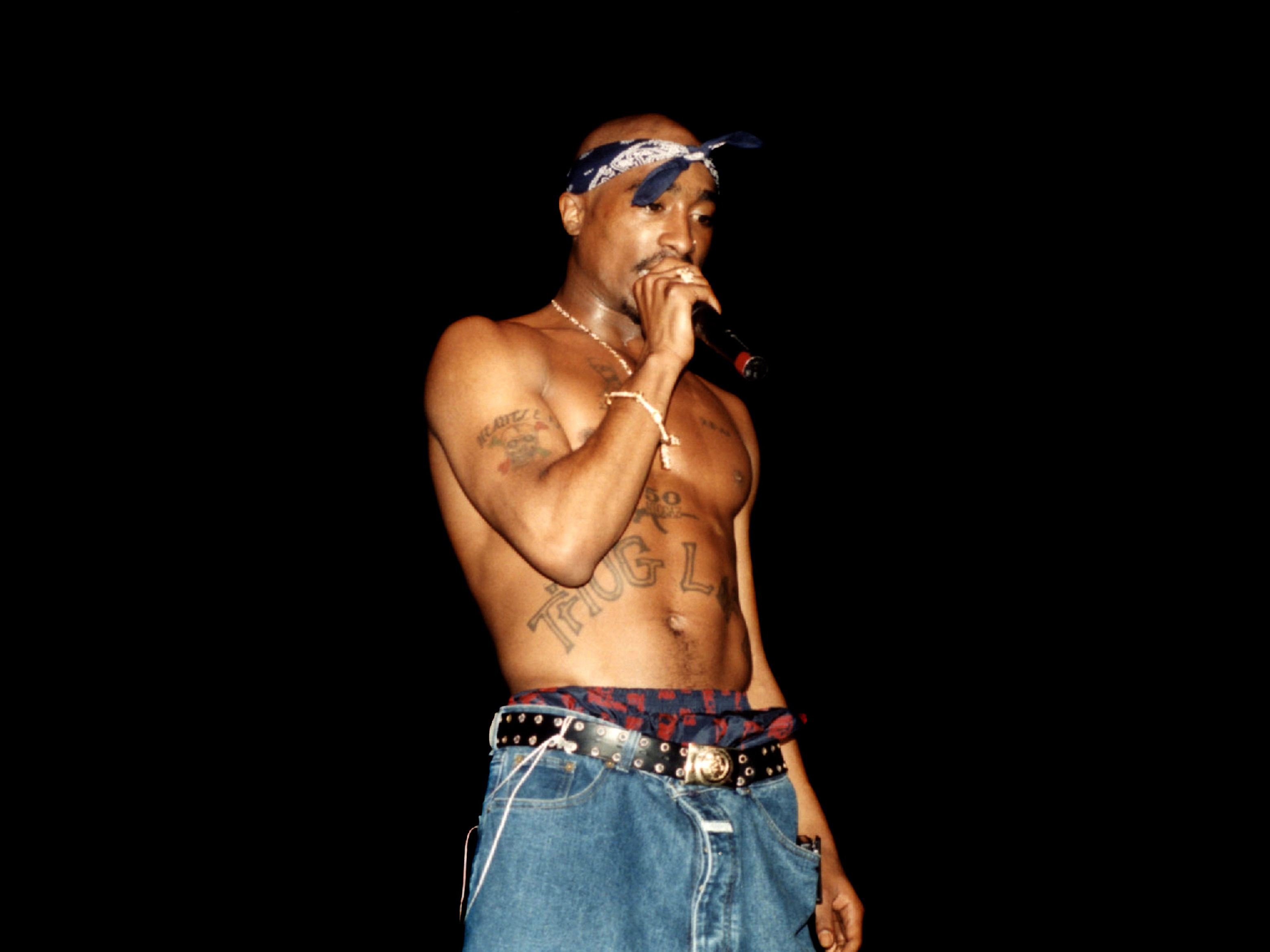Tupac's life was 'yin and yang,' writes author of 'Only God Can Judge Me' 1 Tupac Shakur performs at the Regal Theater in Chicago, Illinois in March 1994.