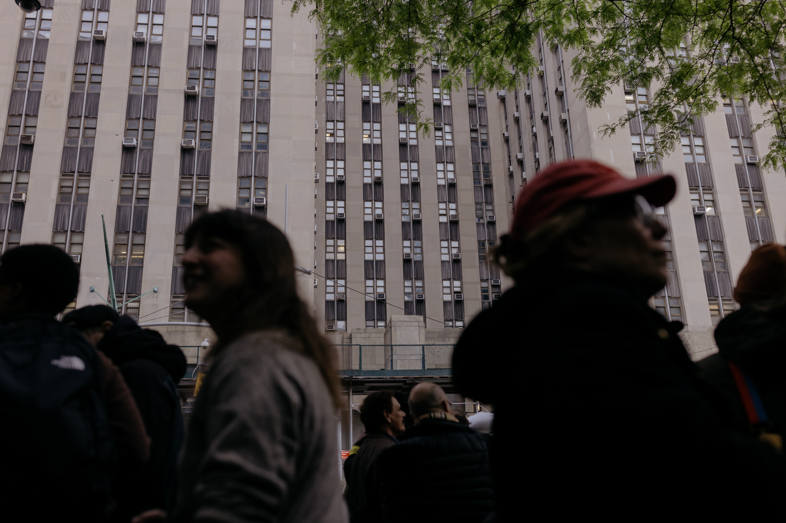 A line forms Monday outside the courthouse for a chance to sit in on the 16th day of former President Trump's hush-money trial in Manhattan, N.Y. (José A. Alvarado Jr. for NPR)
