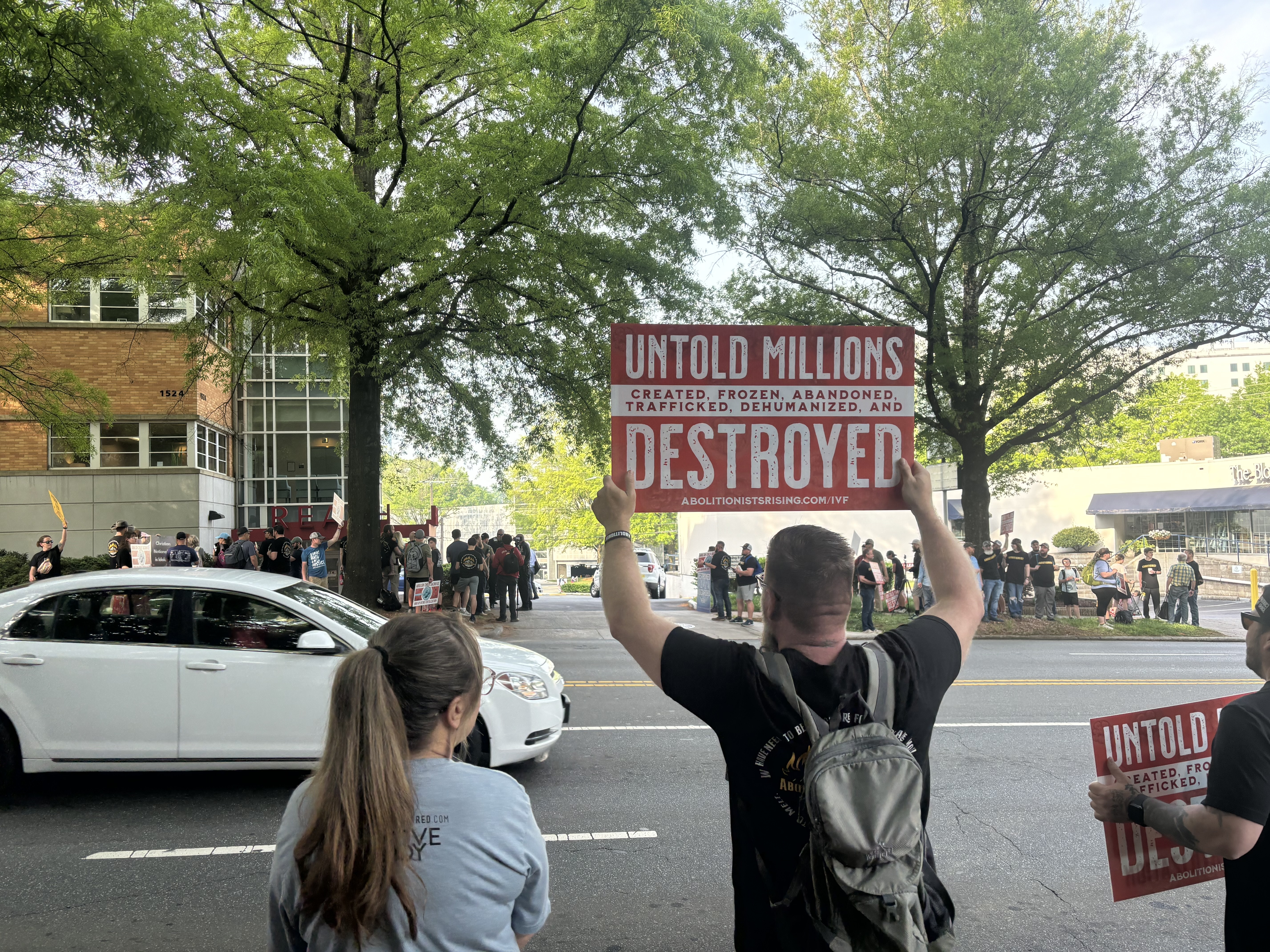 Anti-abortion activists who describe themselves as &quot;abolitionists&quot; protest outside a fertility clinic in North Carolina in April 2024. (NPR)