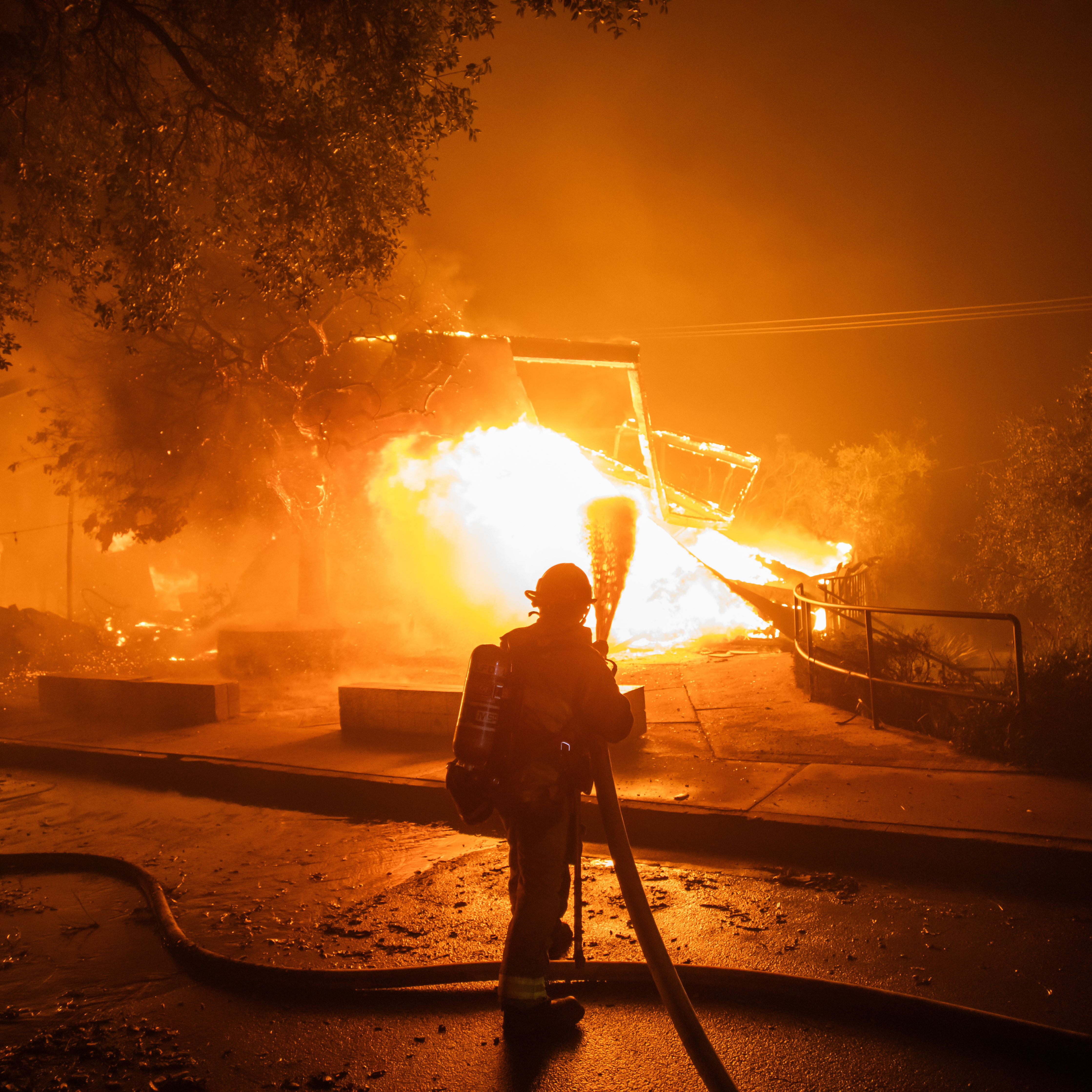 Wildfires displace thousands and ravage greater Los Angeles