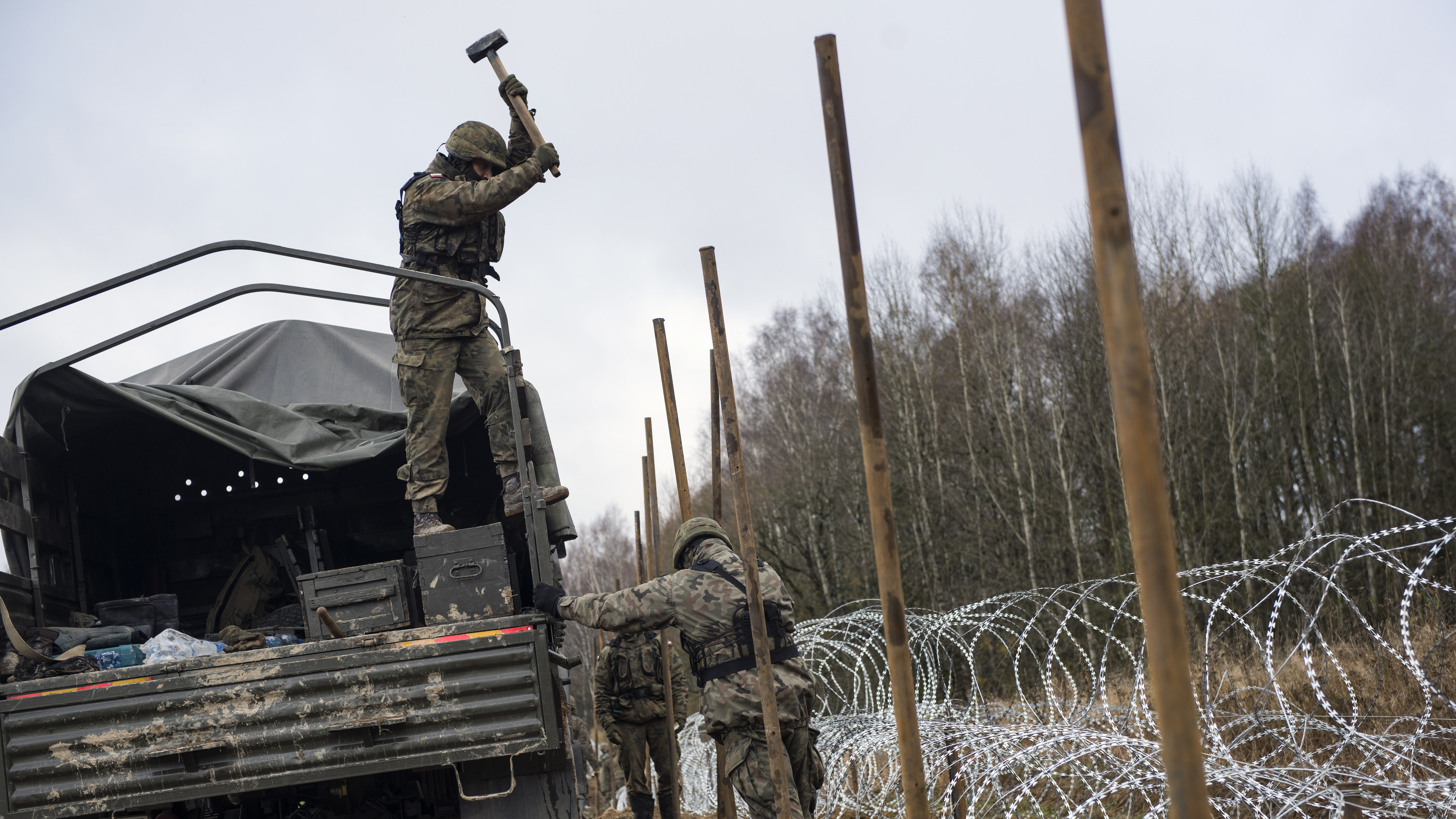 Poland prepares for war : State of the World from NPR