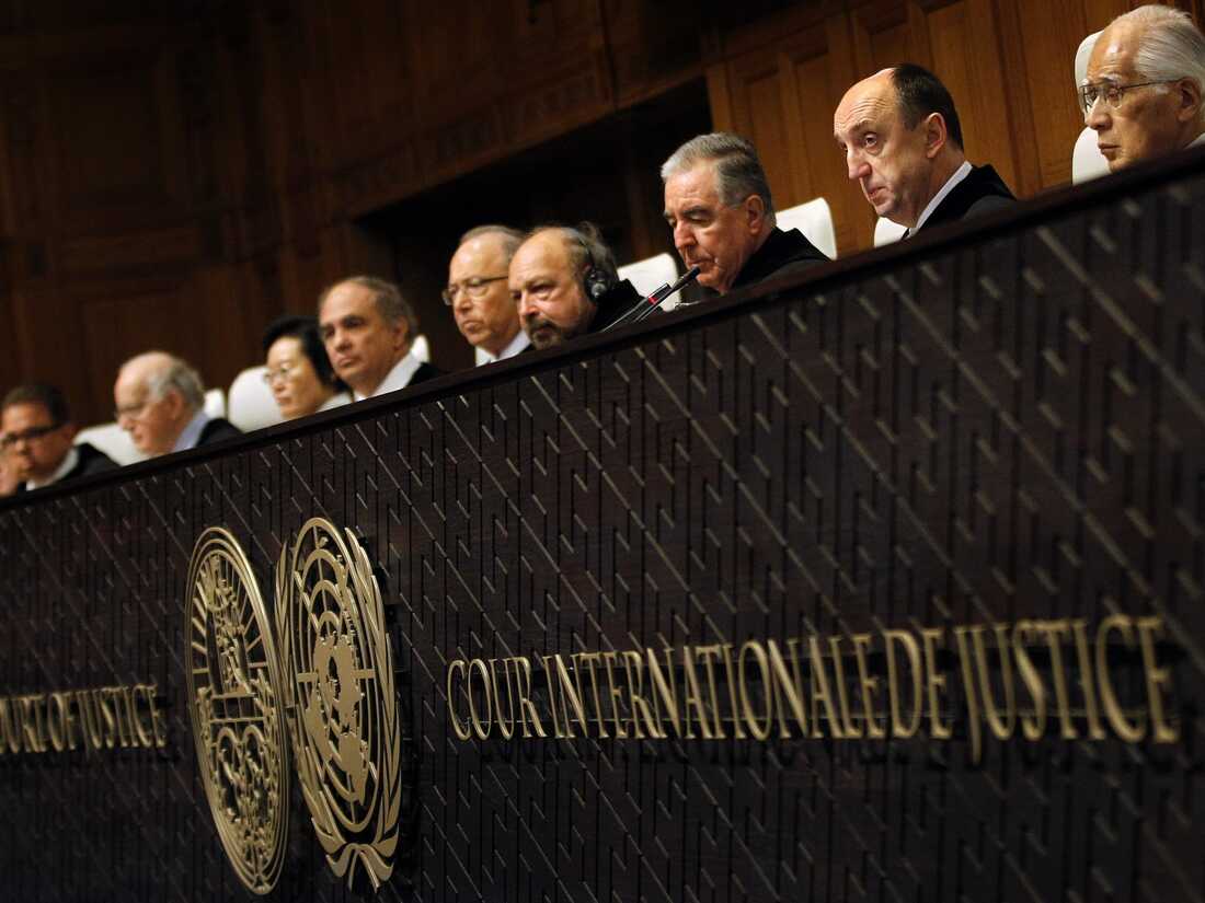 Members of the jurysit in the International Court of Justice in The Hague, The Netherlands, on January 27, 2014 during the judgment on the territorial dispute between Chile and Peru. AFP PHOTO/ANP BAS CZERWINSKI netherlands out (Photo credit should read BAS CZERWINSKI/AFP via Getty Images)
