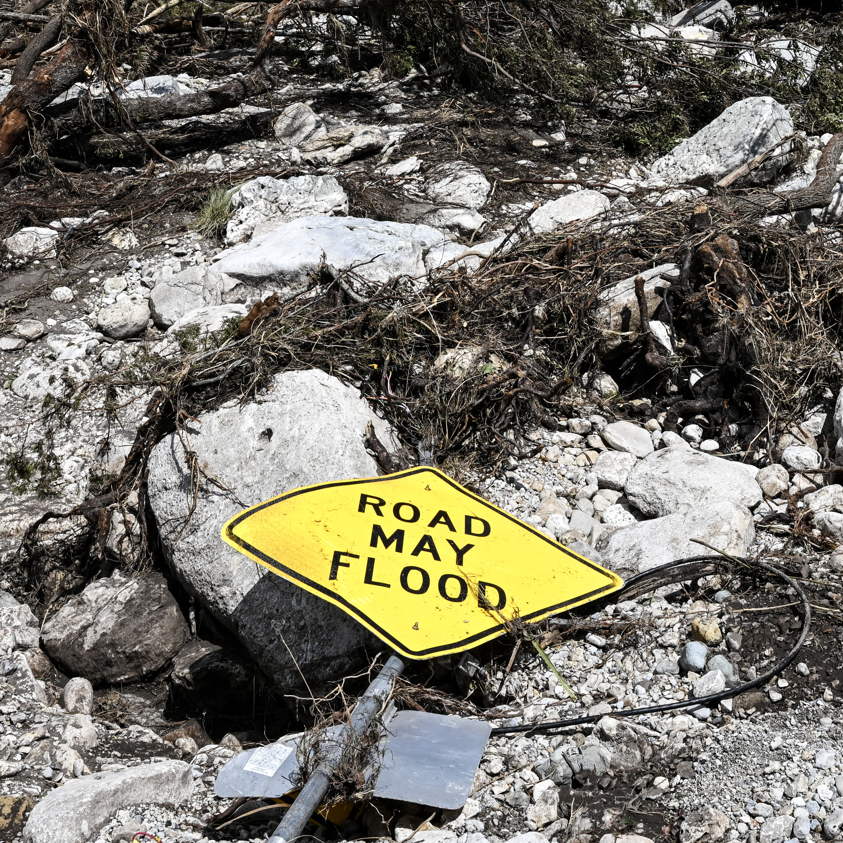 What kind of support does the government offer to help people in flood-prone areas?