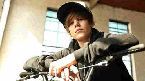 Justin Bieber on a bike