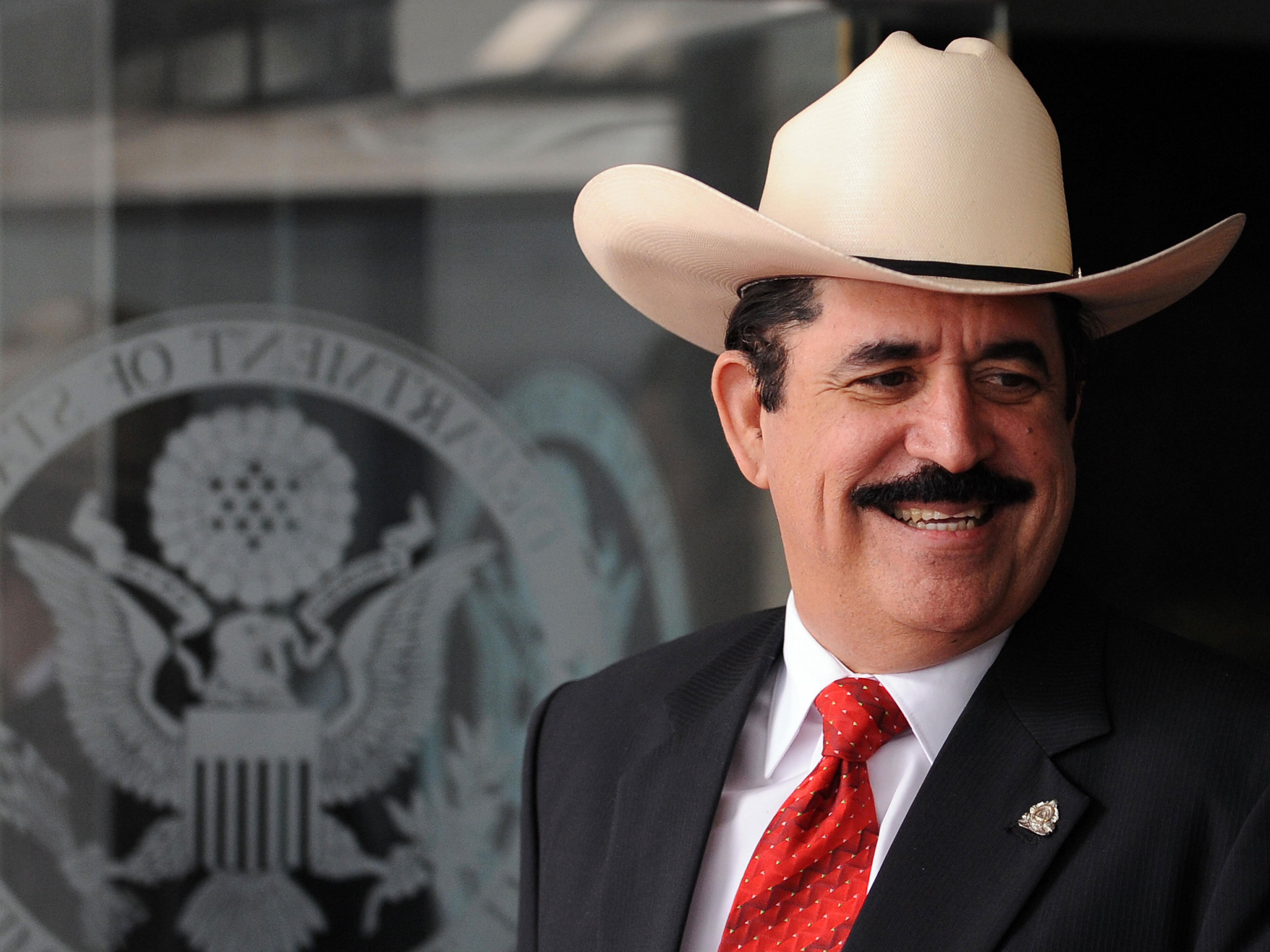 Ousted Honduran President Manuel Zelaya leaves the US State Department after a meeting with US Secretary of State Hillary Clinton in Washington, DC, on September 3, 2009. Secretary Clinton has decided to cut off a 'broad range' of economic aid to Honduras over the June 28 coup that ousted president Manuel Zelaya, her spokesman said. (Getty Images)