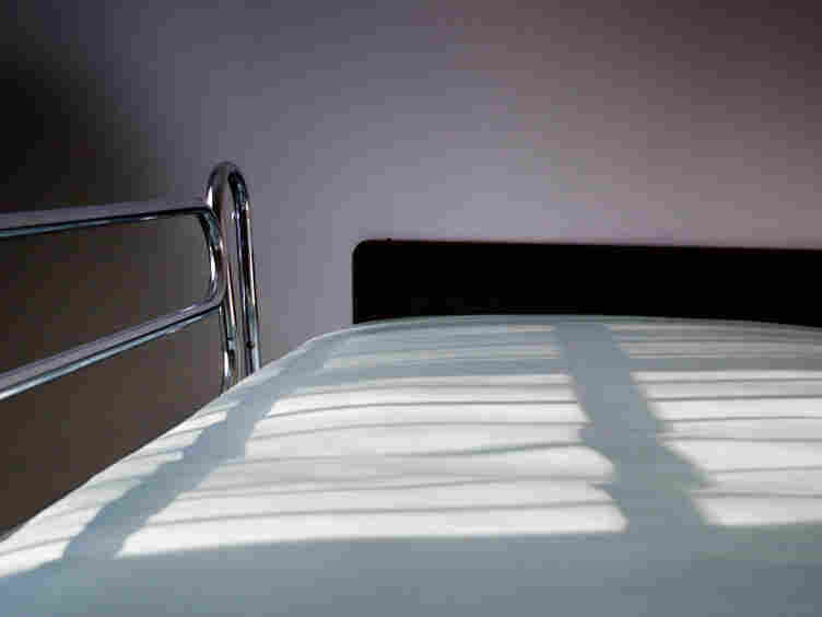 An empty hospital bed.