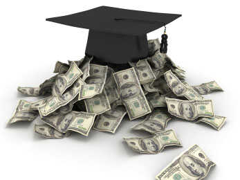 Graduation cap with piles of money