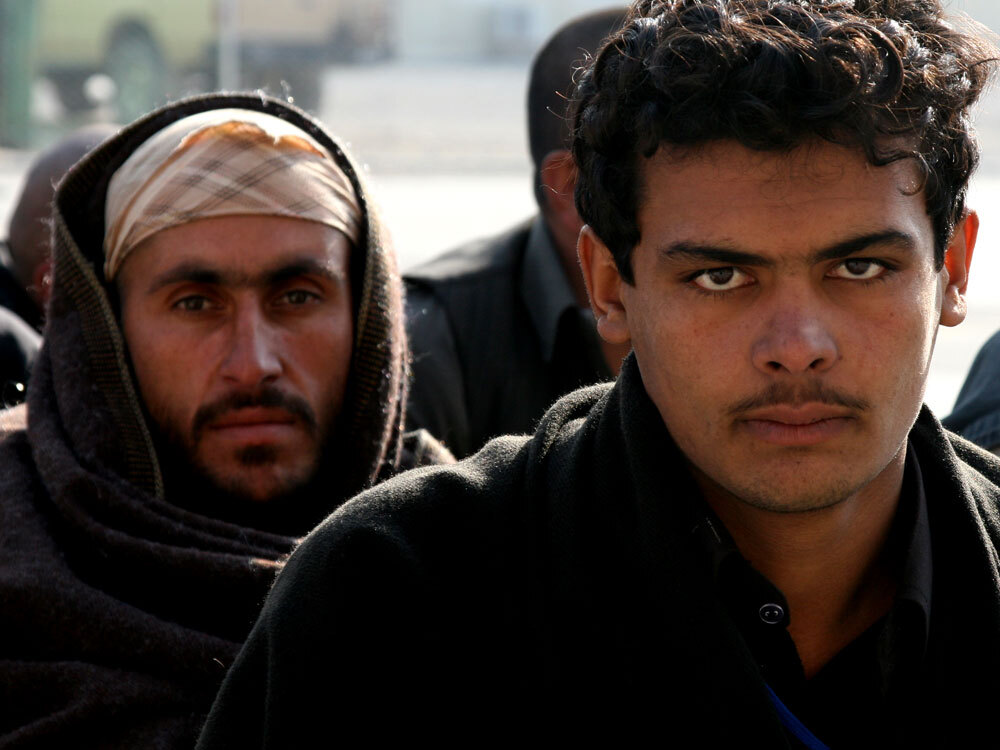 An Afghan recruit waits to be processed at the Kabul Military Training Center.