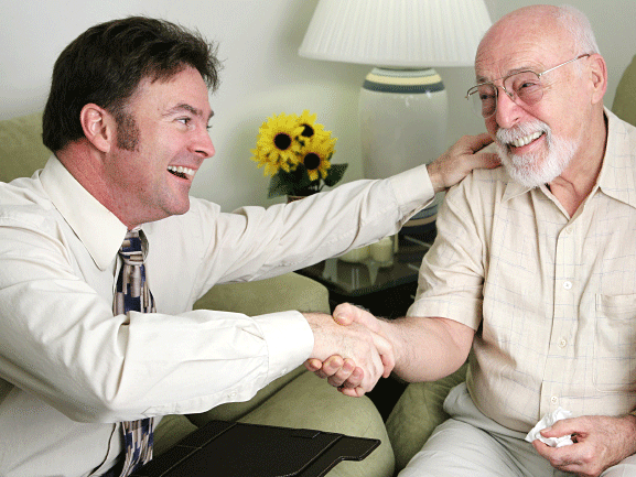 Salesman with elderly man