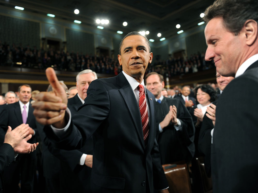 President Obama greets members of Congress on his way to deliver his first State of the Union address on Wednesday. (AFP/Getty Images)