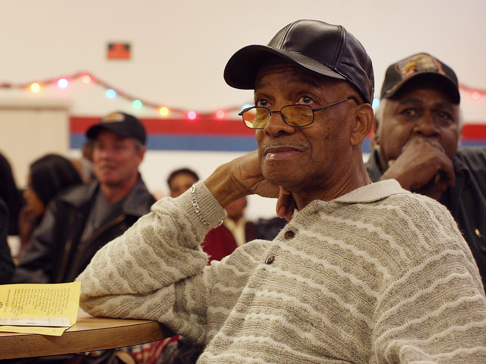 Retired members of the United Auto Workers (UAW) listen to details of their retirement accounts while they attend a monthly benefits meeting in Detroit in 2008. Investment experts say people make the mistake of not adjusting the balance of stocks and bonds in their portfolios after making their initial investment. (Getty Images)