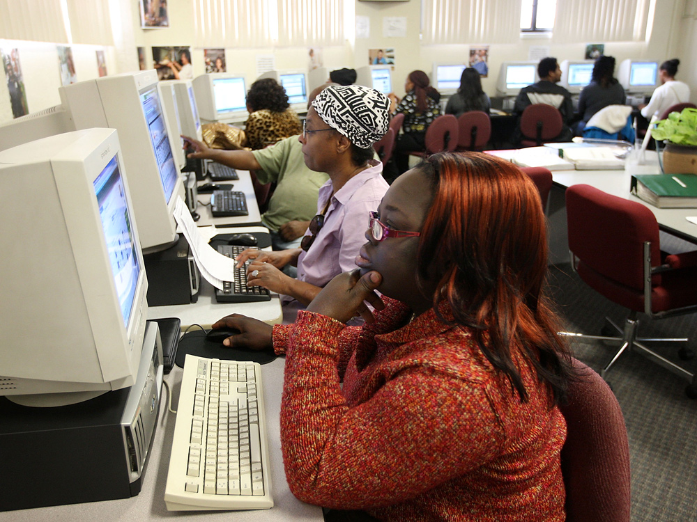 Job seekers surf the Web at a Los Angeles computer lab. Grants and loans funded by the Recovery Act to expand U.S. broadband service will eventually invest a total of $7.2 billion. (Getty Images)