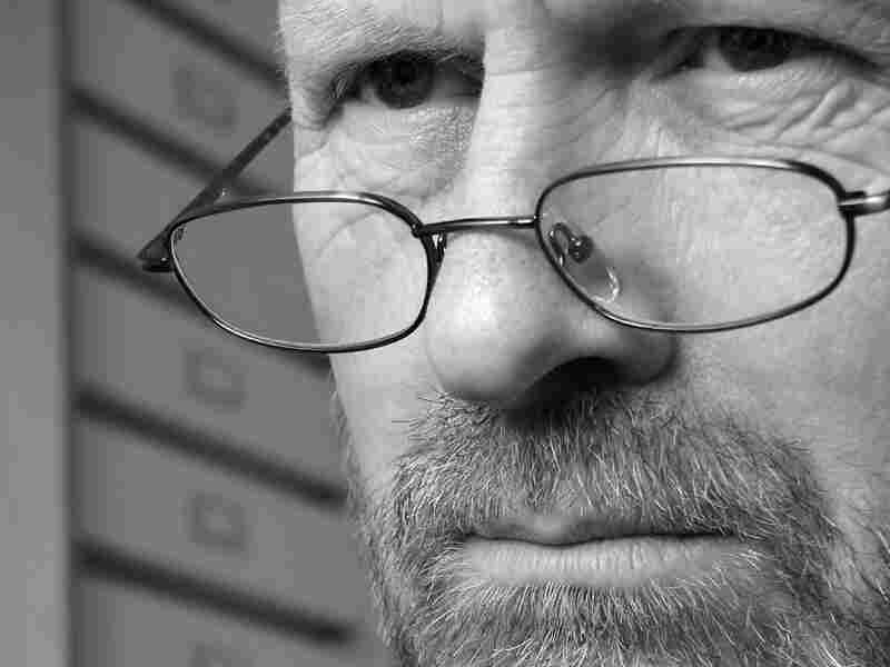 A man wearing glasses.