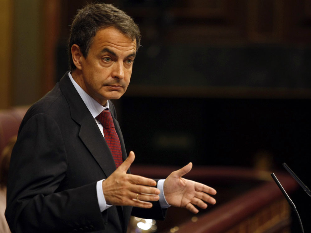 Spain's prime minister, Jose Luis Rodriguez Zapatero, gives a speech at the Parliament in Madrid on Wednesday. Spain's socialist government ordered tough austerity measures — including a wage cut — in an effort to slash the national debt. (STR/AFP/Getty Images)
