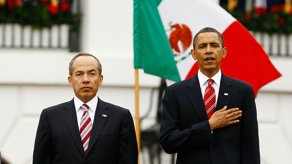 Mexican President Felipe Calderon and President Obama stand for their countries' national anthems during a welcoming ceremony Wednesday on the South Lawn of the White House. (Getty Images)