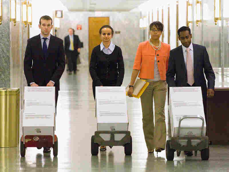 White House staffers deliver to the Senate Judiciary Committee, the responses of their questions.