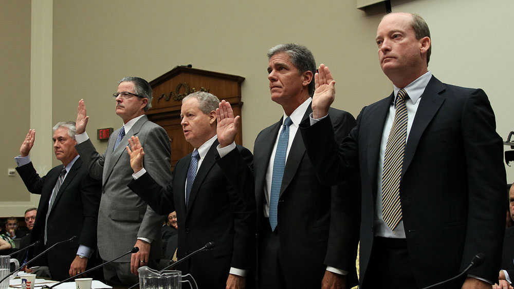 From left: Rex Tillerson, chairman and CEO of ExxonMobil; John Watson, chairman and CEO of Chevron; James Mulva, chairman and CEO of ConocoPhillips; Marvin Odum, president of Shell Oil; and Lamar McKay, chairman and president of BP America are sworn in for a hearing Tuesday before the House Energy and Commerce Committee. (Getty Images)