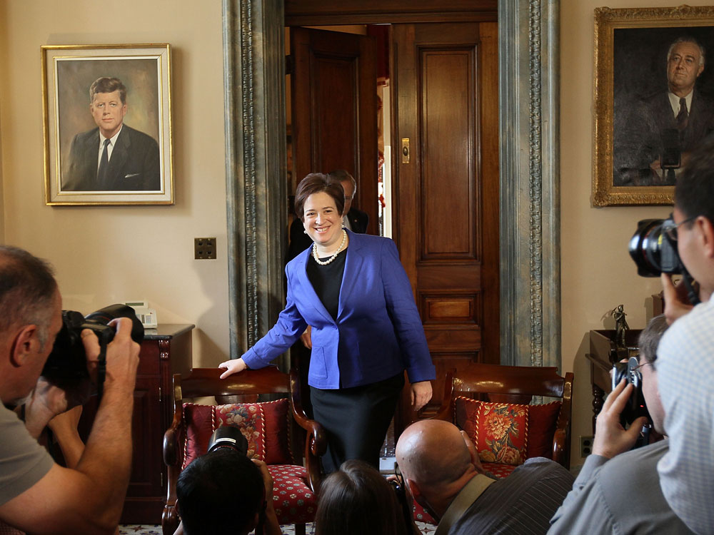 Supreme Court nominee Elena Kagan walks in to meet with Senate Majority Leader Sen. Harry Reid (D-NV) while making the rounds at the U.S. Capitol in May. (Getty Images)