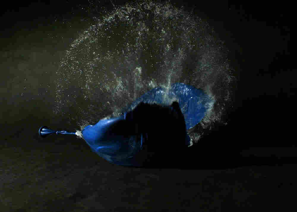 balloon popping with water inside