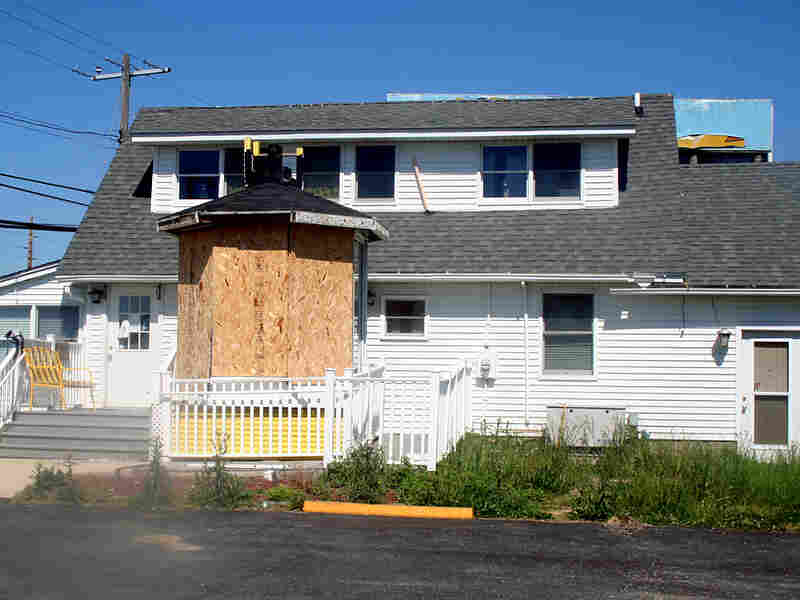 The closed offices of Dr. Earl Bradley, where workers dismantled child-friendly advertising.