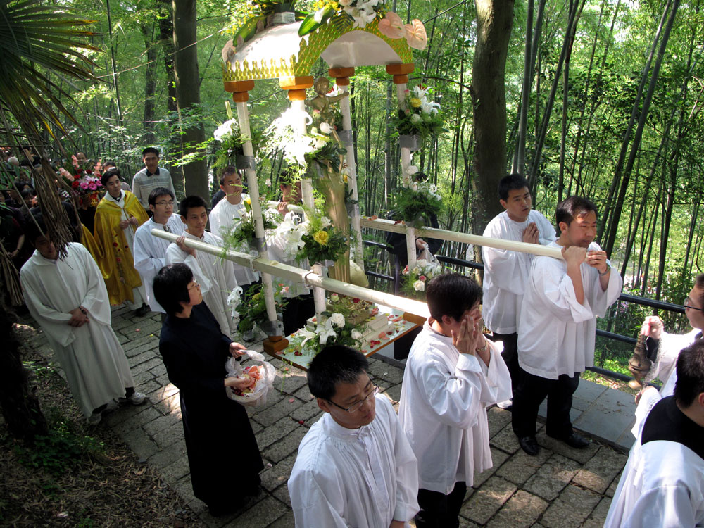 Clergy from the government-sanctioned church in a procession up to Sheshan basilica outside Shanghai