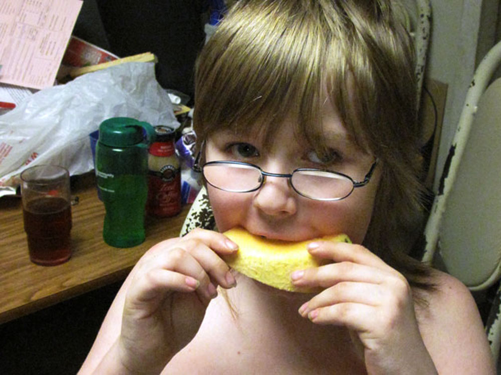 Alex Williamson, 8, is one of 17 million children who live in U.S. households where getting enough food is a challenge. Sometimes it's hard for the poor to eat healthy because it costs more. (NPR)