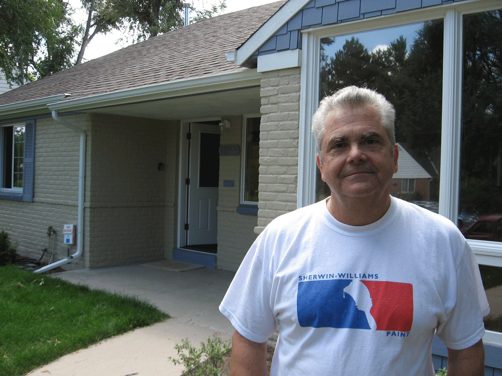 Bob Lynn stands in front of a house he remodeled in Denver. It took nine months to sell it for $295,000 -- $30,000 less than what he was hoping for. (NPR)