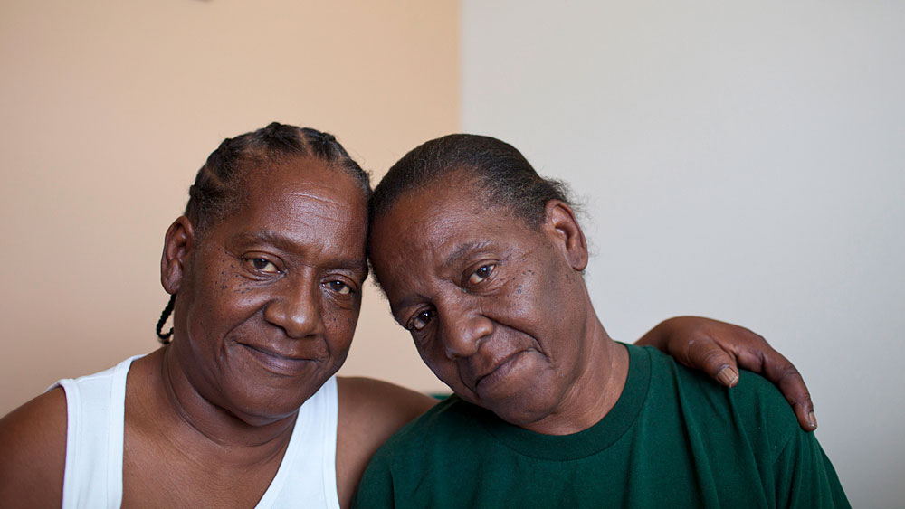 Before evacuating from Katrina, Bobbie Jennings (right) lived next door to her twin sister, Gloria Williams, in the public housing that existed on the same site as Harmony Oaks in New Orleans. While Jennings likes the actual apartment, she says she is unhappy with the new development because the new apartments do not provide the same sense of community as before. (NPR)