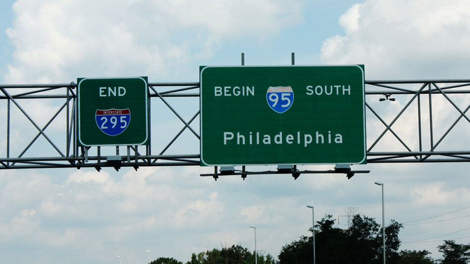 Signs indicate where I-95 begins north of Trenton, N.J. (Joel Rose/NPR)