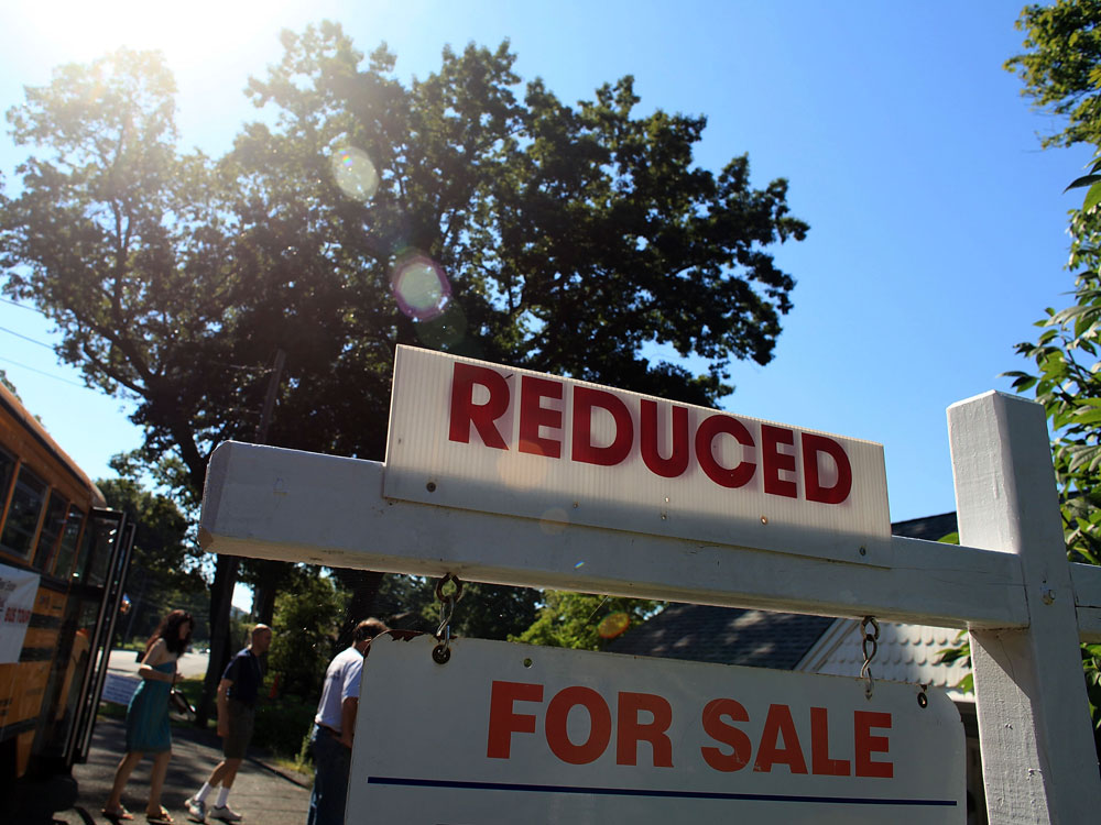 Prospective homebuyers visit a foreclosed home last month in Seymour, Conn. (Getty Images)