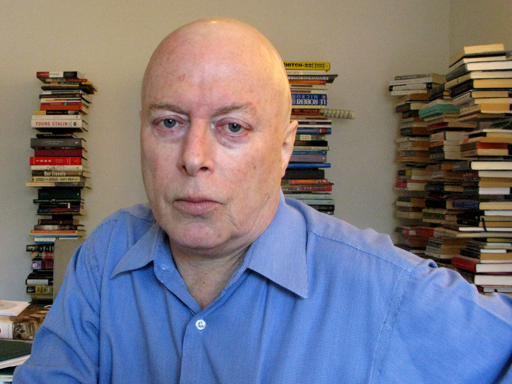 Christopher Hitchens at his home in Washington, D.C. The outspoken atheist and gleeful provocateur was diagnosed with metastasized esophageal cancer in June. He says that the doctors say he has a chance of remission, but his chances of living longer than five years are slim. (NPR)
