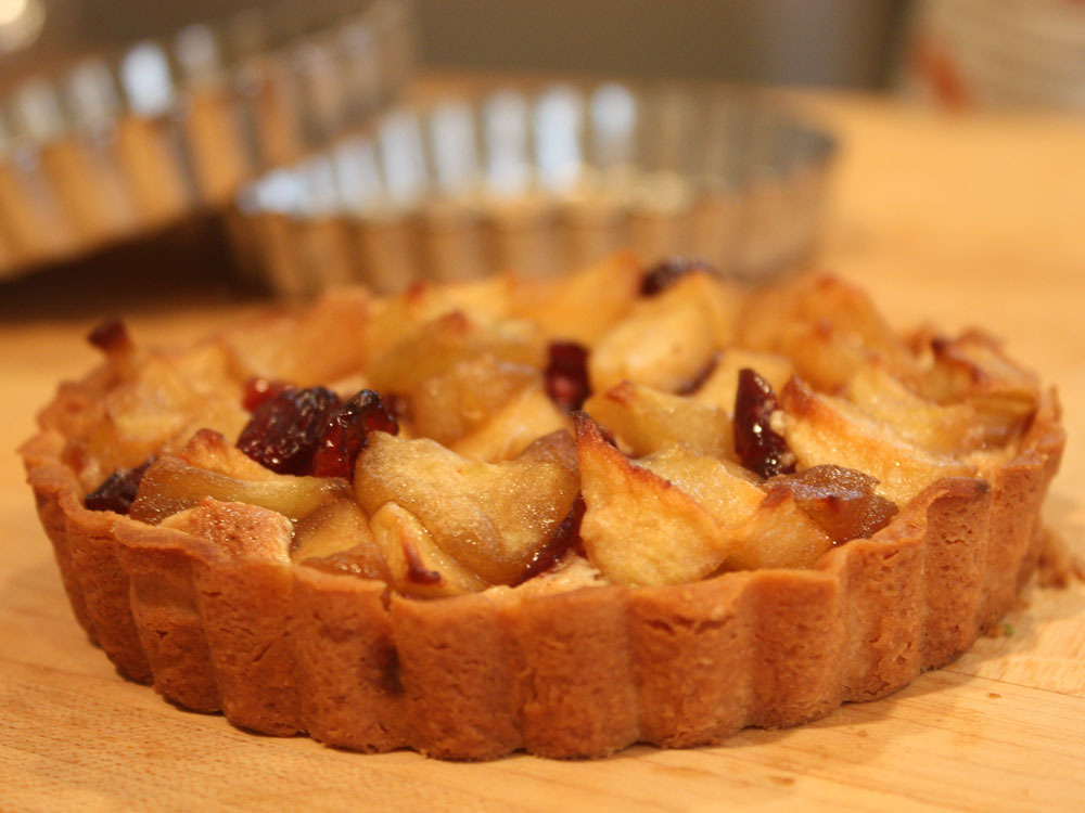 Get the recipe for <a href=&quot;http://www.npr.org/templates/story/story.php?storyId=131123226#131124092&quot;>Apple Cranberry Frangipane Tart</a>. (NPR)