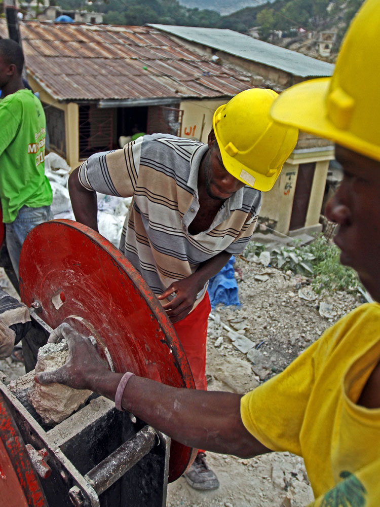 Haitians Take Rubble Removal Into Own Hands