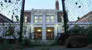 How much can a school remake the neighborhood it's in?