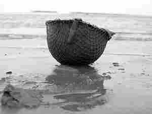 Soldier's helmet on the shoreline