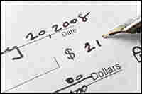 Writing a check.