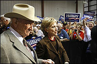Candidates Woo Texans on Eve of Primaries 1 New York Sen. Hillary Clinton is escorted onto the stage by former Congressman Jack Brooks at a campaign rally March 3 in Beaumont, Texas.