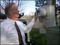 State energy planner John Harrington monitors energy use for state buildings.