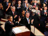 President Obama waves as he prepares to deliver his address to a joint session of Congress