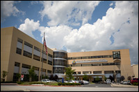 At Howard County General Hospital in Maryland, two patients had drastically different experiences. One owes $50,000 after he had a heart attack and didn't have insurance. The other, who has insurance, is getting nearly everything paid for her after she was diagnosed with breast cancer.