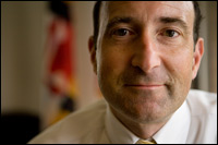 Howard County's health commissioner, Dr. Peter Beilenson, is in charge of a new program in Maryland that offers low-cost insurance to those who are eligible. But not many people are signing up.