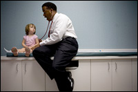 Dr. Wendell McKay examines 2-year-old Emma Churchill at his pediatric office in Howard County. He says his practice could be made more efficient through electronic record keeping.