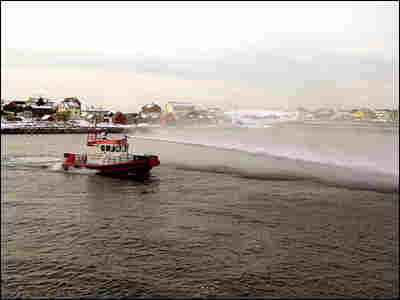 A boat demonstrates the high-power water hose designed to keep pirates at bay.