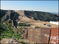 The U.S. Department of Homeland Security is filling in Smuggler's Gulch between San Diego and Tijuana, Mexico, with almost 2 million cubic yards of dirt. The rugged canyon is the site of smuggling of every type of contraband imaginable.