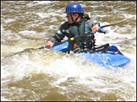 Mike Larkin braves the rapids on the now-cleaner Cuyahoga River. (NPR)