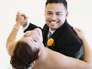 A wedding couple enjoys their first dance.