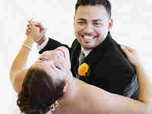 A wedding couple enjoys their first dance.