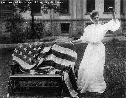 A Woman Signs The Star Spangled Banner, circa 1900s