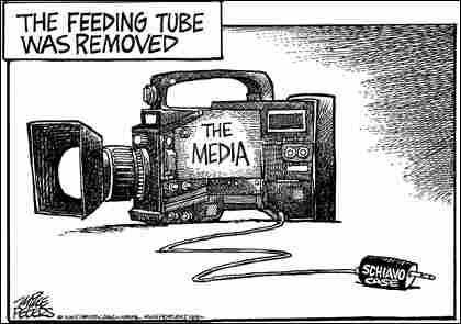 Peters-Media. Credit: Mike Peters, Dayton Daily News.