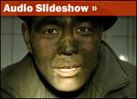 A miner at the end of his shift at the Jin Hua Gong coal mine in Shanxi province